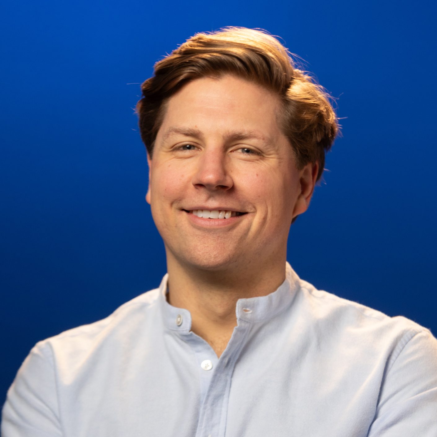 JoelBlueHeadshotSquare - JoelByarsComedy